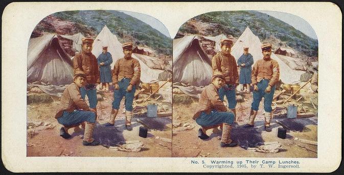 Warming up their camp lunches