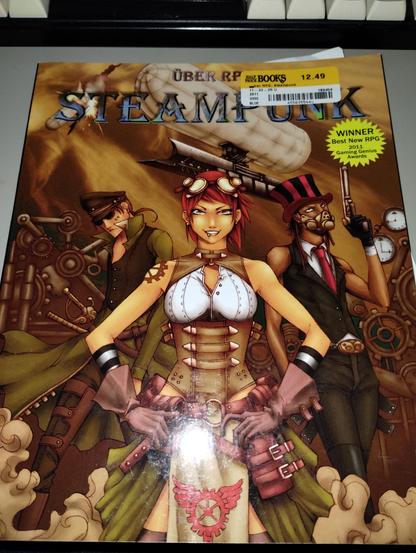 Uber RPG Steampunk core book, This looked very interesting when I saw it half price book - I've always liked the idea of Steampunk - The book says it can be played as a table top RPG or as Live Action Rollplaying which sounds very interesting to me - and maybe one day I'll get to play with that idea.
Made by Uber Goober Games 2011