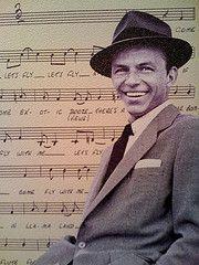 Living from Being not Doing: Sepia photograph of a young Frank Sinatra in front of enlarged sheet music. Image attribution Flickr user stevegarfield