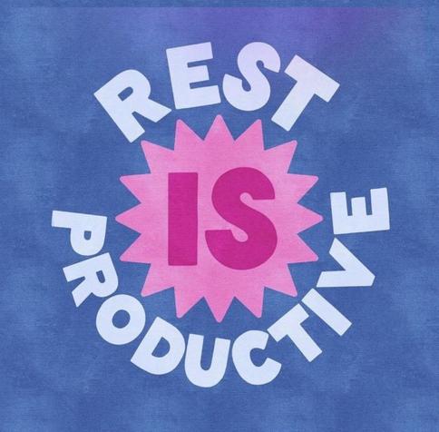 White writing in a circle around a pink sun shape. The white and pink text reads "Rest is productive". The background is blue.