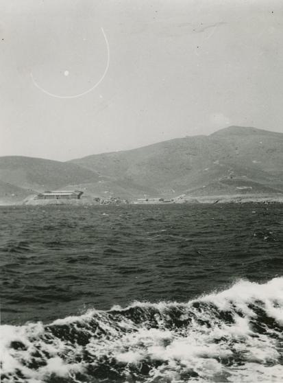 Gyaros Island of Exile - "On the left, the new penitentiary. At the centre, the Hellenic Red Cross hospital." ICRC V-P-HIST-E-06118.JPG 26-28.08.1950