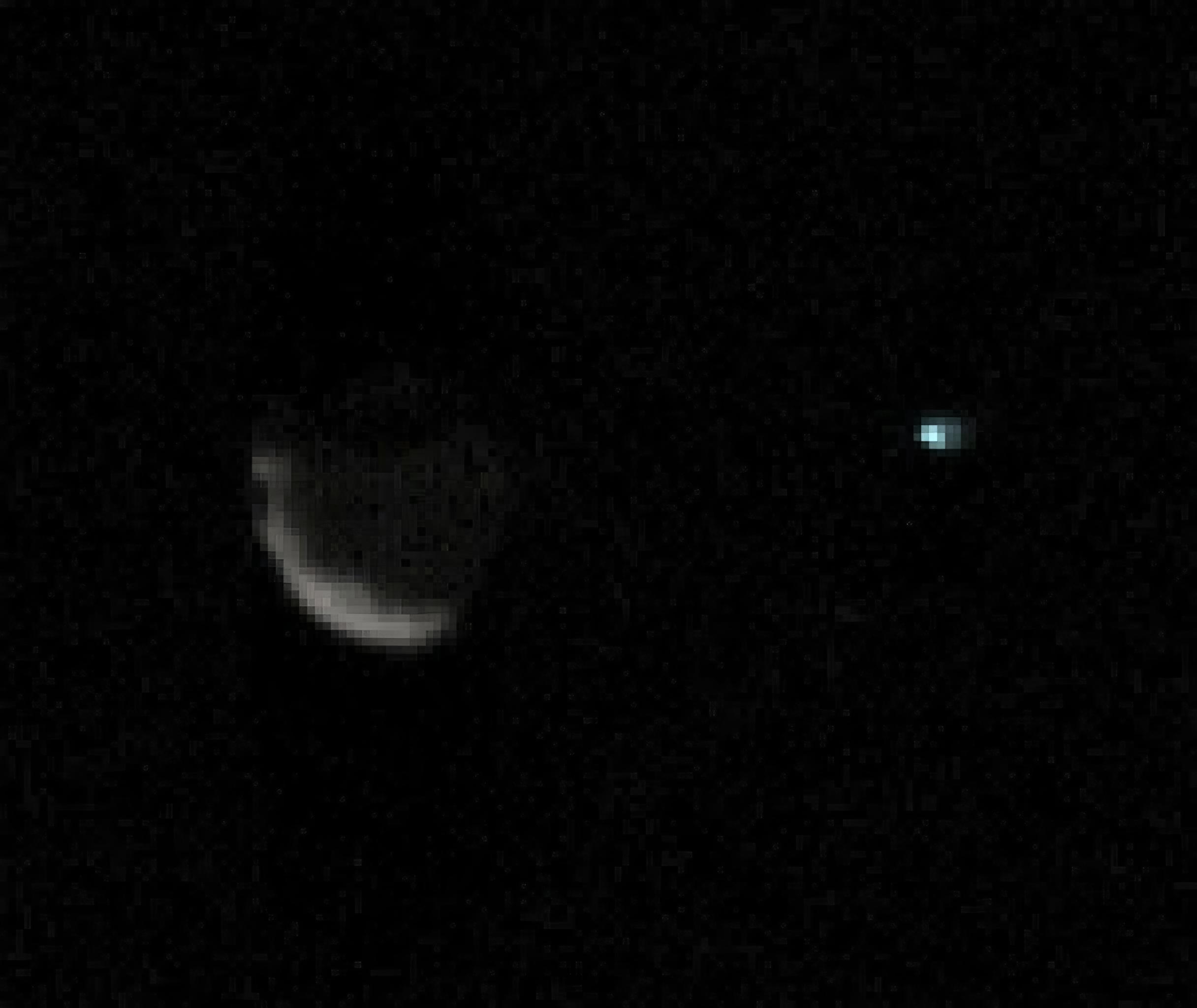The image is a composite of five short exposures and 12 long exposures all taken on Sept. 5, 2024, the 4,295th Martian day, or sol, of Curiosity's mission. An inset in the image shows Phobos on the left and Earth on the right. From the rover's perspective, the inset area would be about half the width of a thumb held at arm's length.