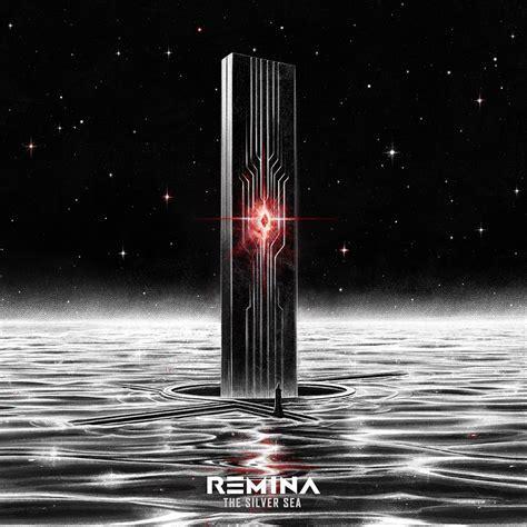 The album cover of "The silver sea" by Remina. It shows a metallic silvery sea under a dark starry sky. In the middle there is a long rectangular monolithic object coming out of the waves with some vertically etched lines and a red light in its middle. A tiny human shaped figure is in front of it.