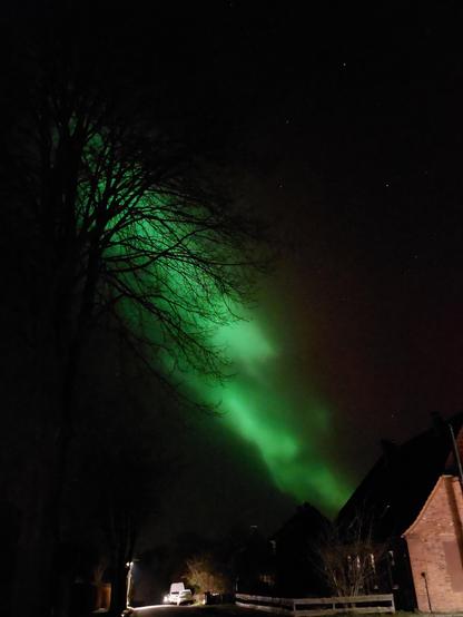 Brilliant green aurora borealis from the street where I live.