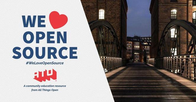 Left side says We Love Open Source. #WeLoveOpenSource. ATO. A community education resource from All Things Open. Right side has a wooden-plank bridge with metal, well-lit railings leading into an urban town.