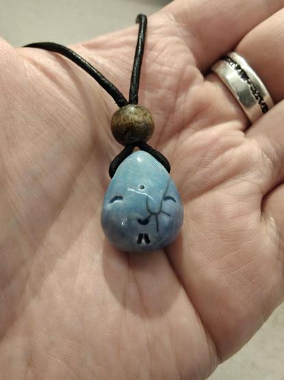A happy little raindrop pendant, in gorgeous shades of blue.