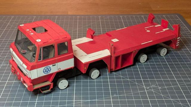 A photo of the whole truck with the cab in the normal position.