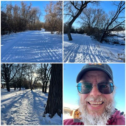 Grid of four photos: 

1) Snowy pathway through a young forest, with ski tracks on either side of the path, under a clear blue sky.

2) Snowy pathway with bare trees and the frozen-over Rideau river on the far right.

3) Snowy pathway with bare trees and the sun a bit over the horizon.

4) Selfie of a white bearded man with glasses, a black ball cap with Canadian and Ukrainian flags on it, an orange hoodie, a red outer coat, and a beard lightly covered with ice.
