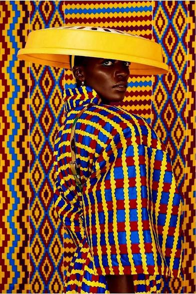 Up-and-coming Kenyan photographer Muriu‘s photos are a gorgeous and original blend of traditional African patterns and haute couture. While her images could be taken straight out of an issue of Vogue, it is these patterns, use of Black models and natural afro hairstyles that stunningly celebrate African and Black culture.

Inspired by the covers of prominent fashion magazines and the rich cultural history of her own Kenyan heritage, she aims to highlight the natural beauty of women with whom she identifies. 

Muriu photographs her subjects in striking, intricately patterned fabrics that often resemble the traditional textiles of various African countries and cultures. Backdropping the subjects using the same vibrant pattern, Muriu creates hypnotizing illusions. 

She has increasingly gained recognition for her distinctive images and was awarded the 2020 People’s Choice Award for Emerging Photographer of the Year at Photo London. Many of Muriu’s images also feature models wearing ornately constructed hairstyles, further illustrating her examination of themes surrounding Black womanhood and pushing the boundaries of beauty standards.