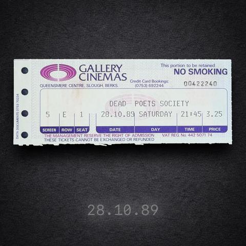 A faded late-1980s cinema ticket for Dead Poets Society from Gallery Cinemas at the Queensmere Centre, Slough. The ticket shows the date Saturday 28 October 1989, a 21:45 screening, and a price of £3.25, printed in blue and purple on white paper with perforated holes along the left edge.