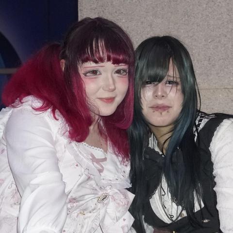 Portrait of 2 cosplayers.