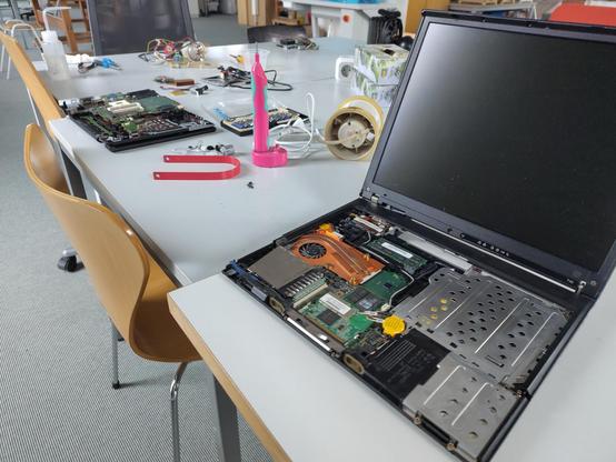 A disassembled Notebook on a table