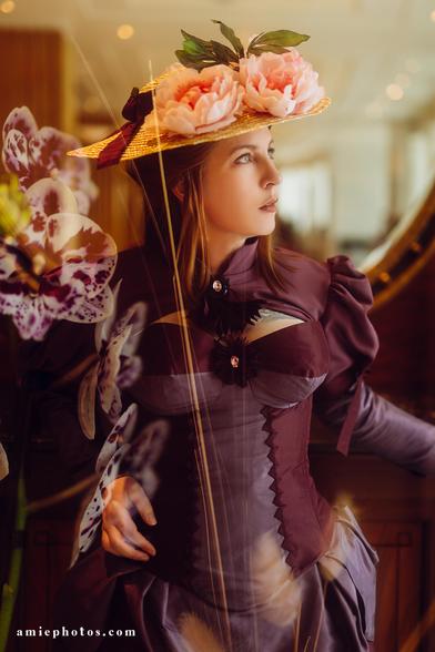 An extremely fancy portrait of me in my extremely fancy costume. It is a double exposure with some convenient matching purple orchids.