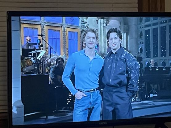 Connor Storrie and Hudson Williams stand at Saturday Night Live’s home base to introduce Mumford and Sons. 