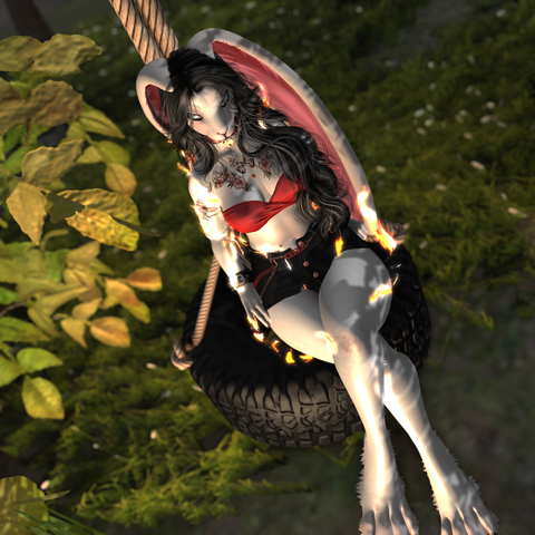 Fire bunny sitting on a tire swing
