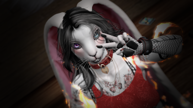 Bunny girl with her hand up in a peace sign. Intended as a selfie.