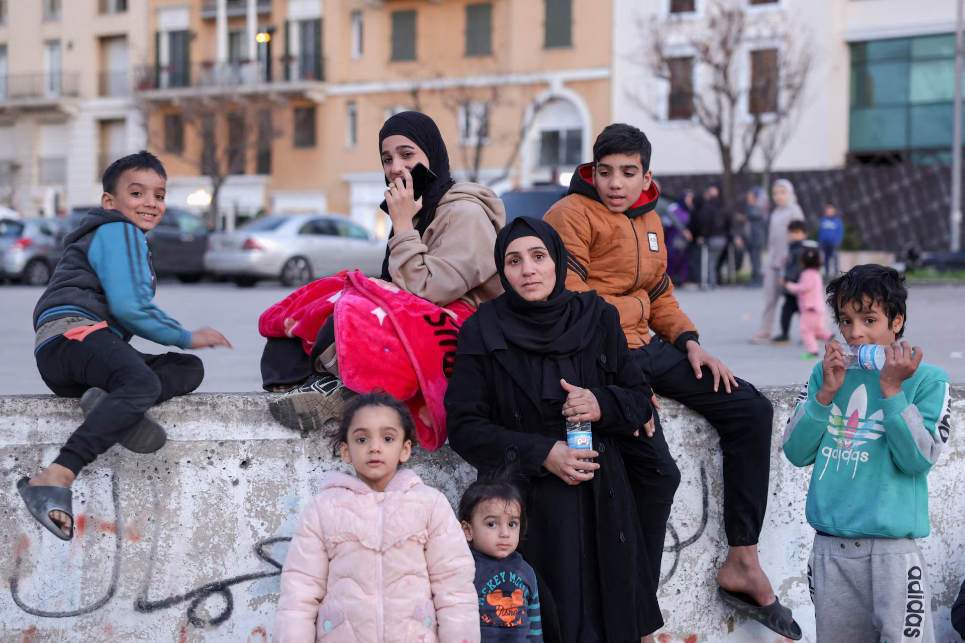 A displaced woman with children.