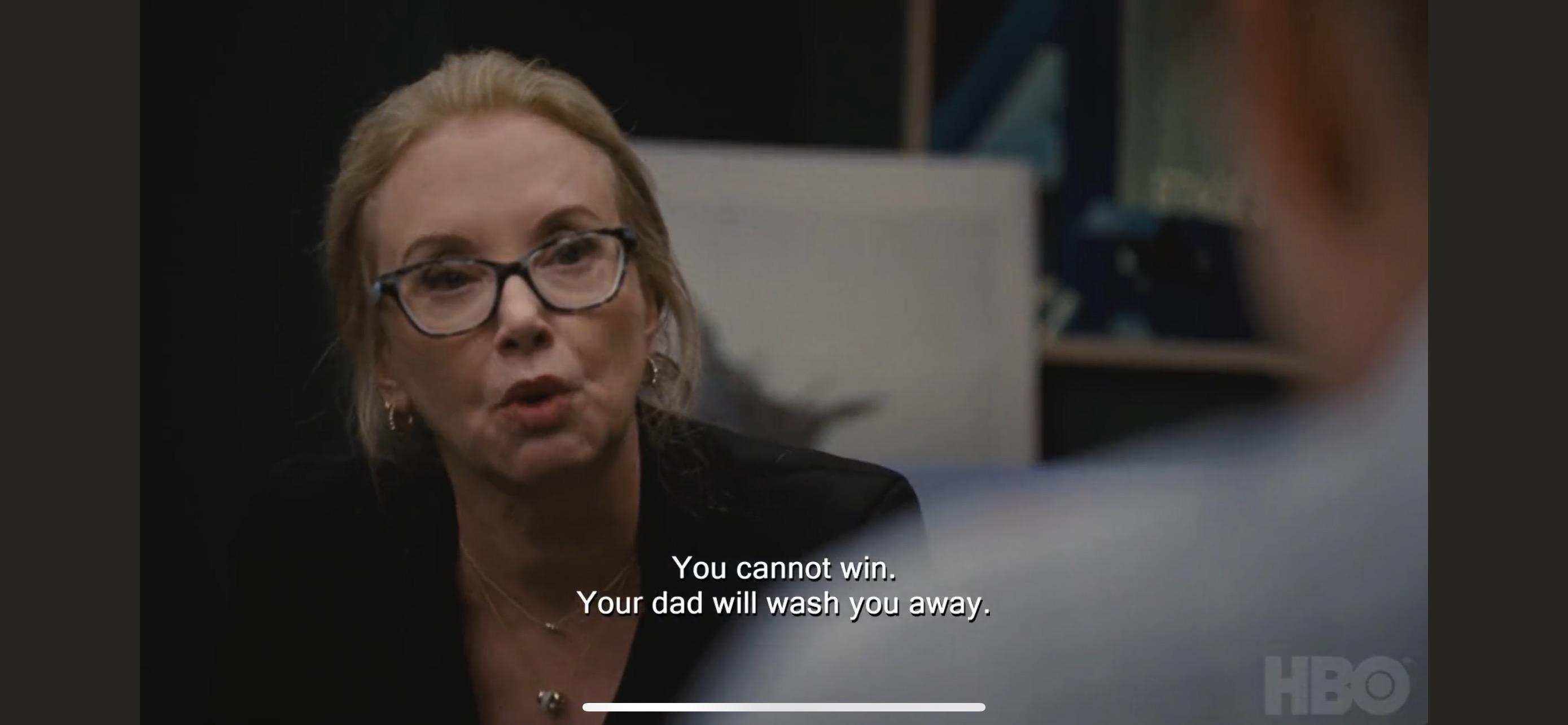 Over the shoulder shot. Gerri wearing glasses. "You cannot win. Your dad will wash you away"