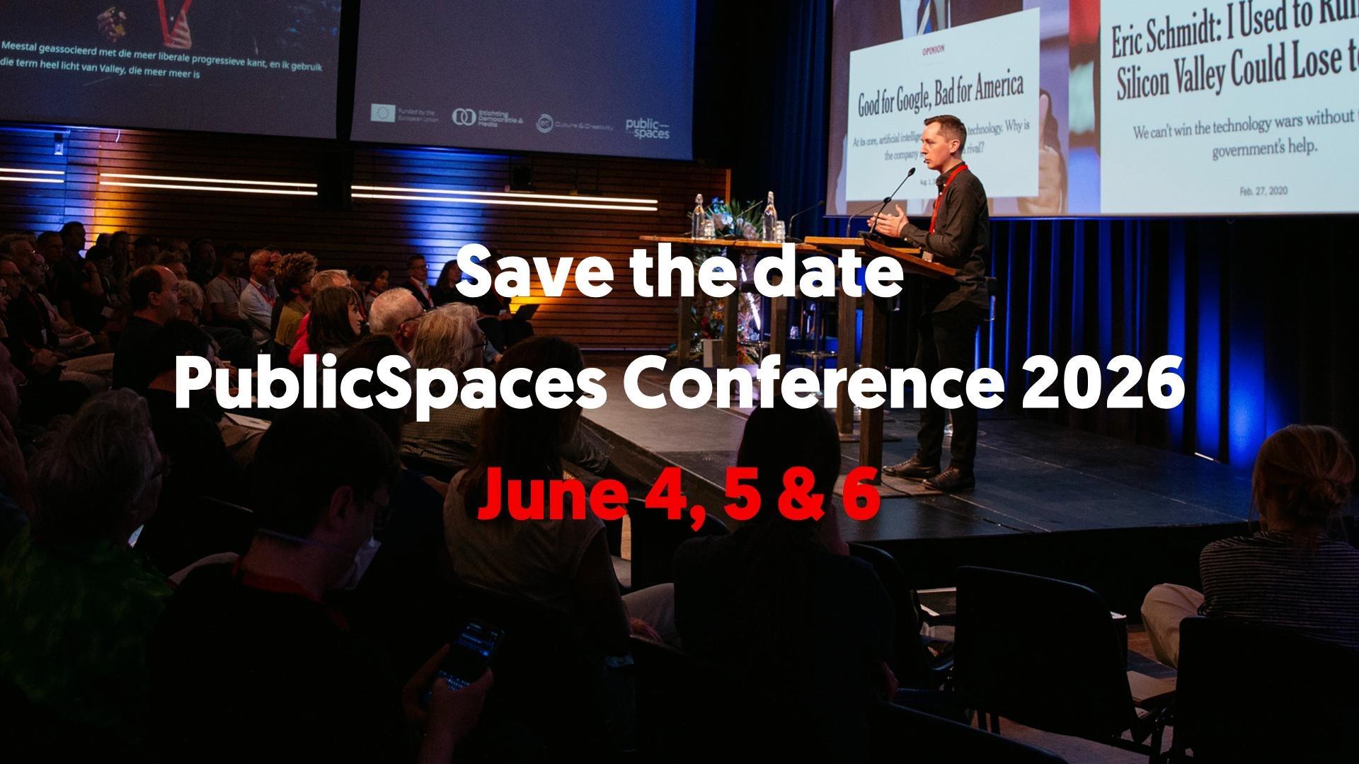 Photo of conference hall with audience facing a stage where a speaker stands at a podium. Multiple projection screens and colorful stage lighting visible. White text overlay reads "Save the date" and "PublicSpaces Conference 2026" with red text "June 4, 5 & 6" below.