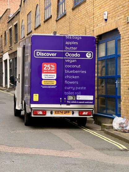 An Ocado delivery truck listing various ingredients on the right hand side, including apples, butter, and chicken. Also, “vegan”. Mmmm, vegan!
