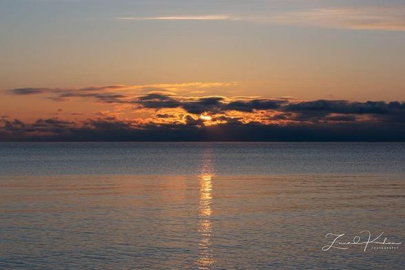 Sunrise over Lake Ontario as seen from Tommy Thompson Park.