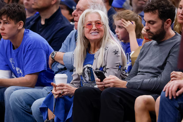 Dallas Mavericks owner Miriam Adelson, center, sits courtside during the second half of an NBA basketball game between the Mavericks and the Orlando Magic, Sunday, Nov. 3, 2024, in Dallas. (AP Photo/Gareth Patterson)
Gareth Patterson / AP