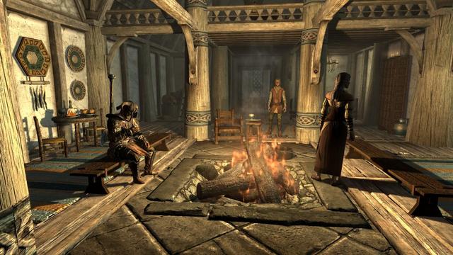 A hearth in the middle of a tavern. An armored warrior sits nearby on a wooden bench. A barmaid stands near the hearth and a bard stands in the back of the room.