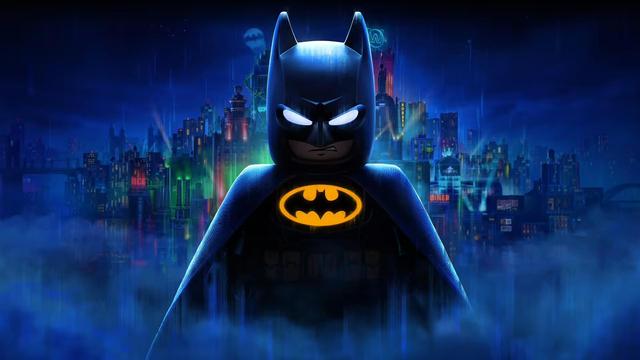 L'iconico logo di LEGO Batman Legacy of the Dark Knight su sfondo Gotham City