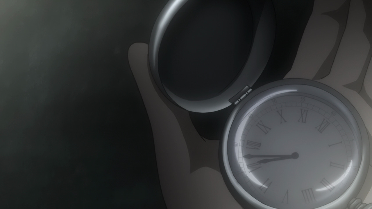 A stop watch being held in a hand.