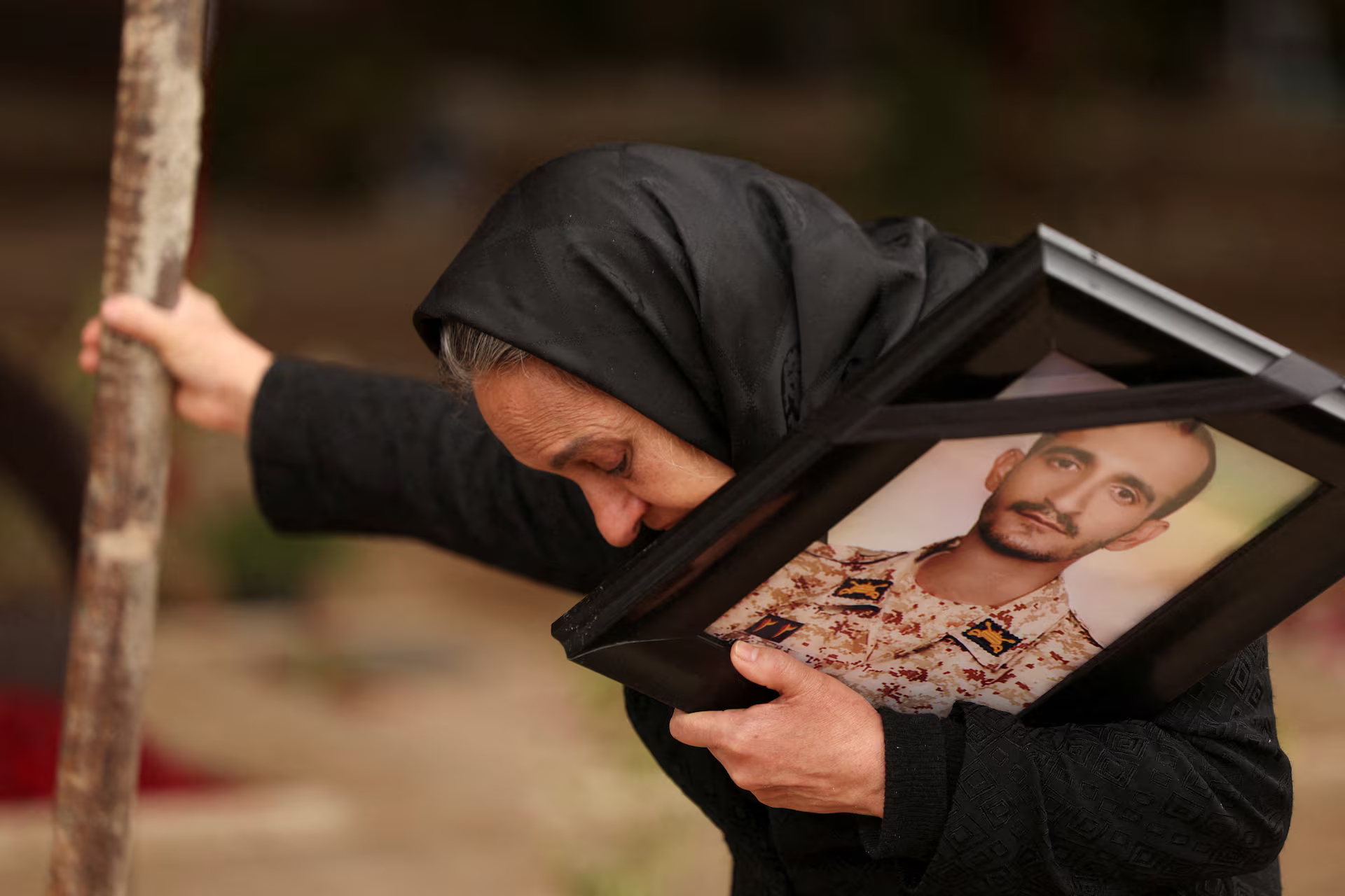 A woman mourning the loss of her son.