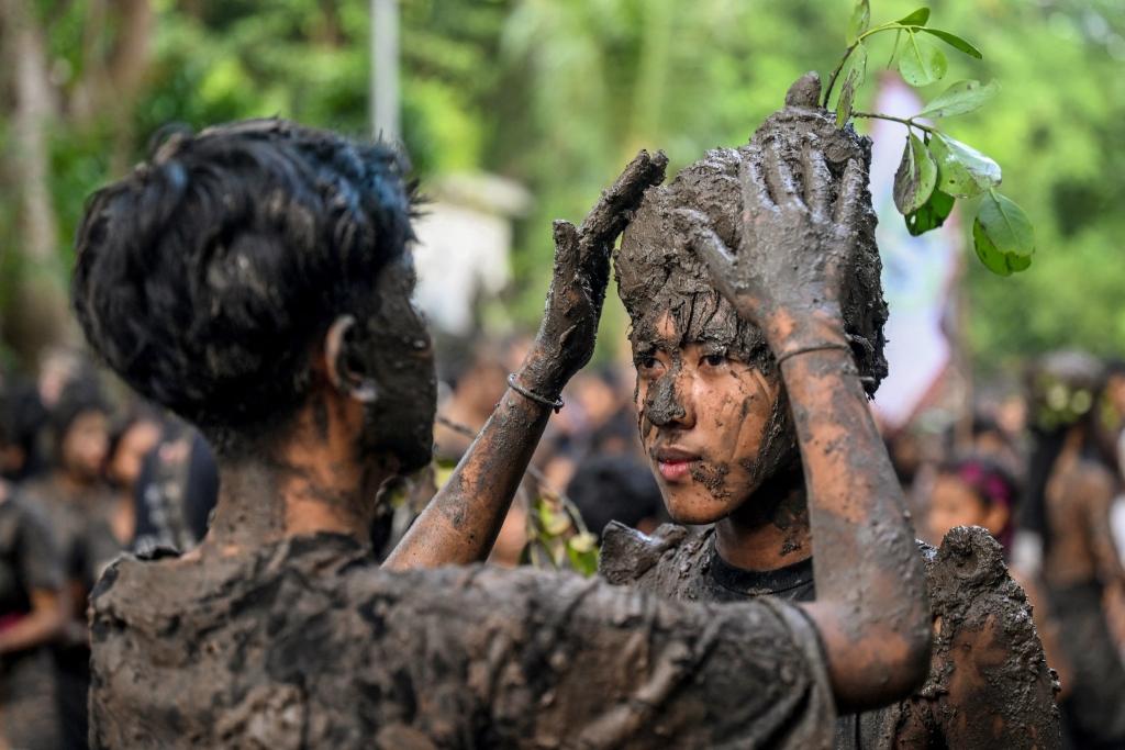 A mud bath purification ritual.