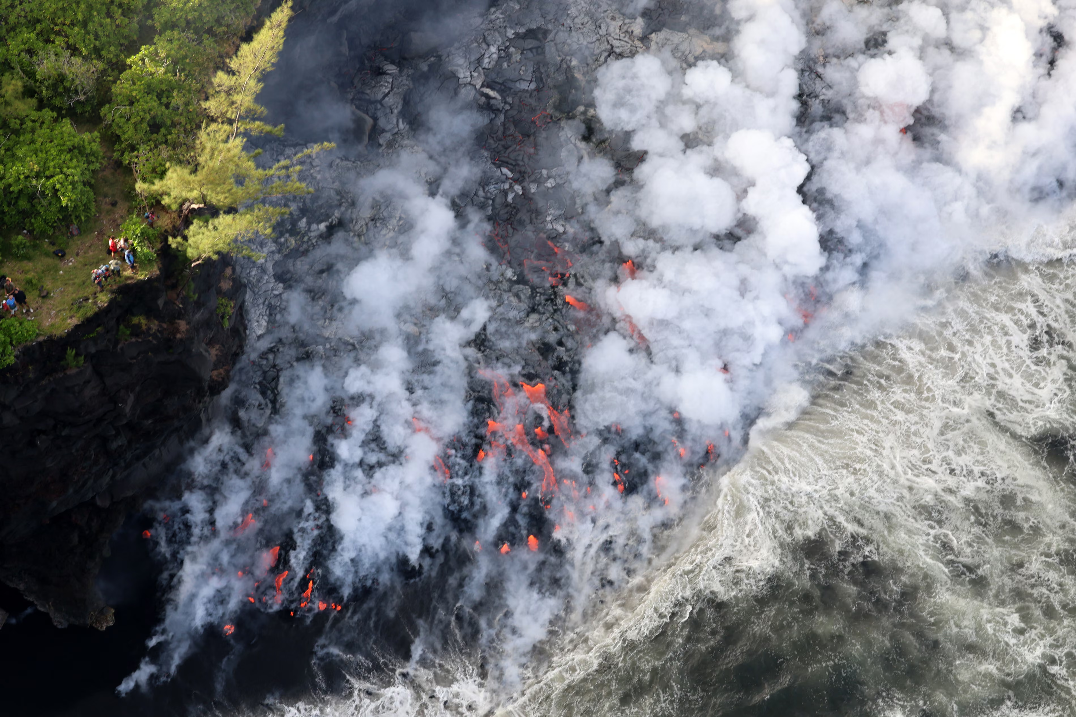 Lava from the Piton de la Fournaise volcano reaches the ocean.