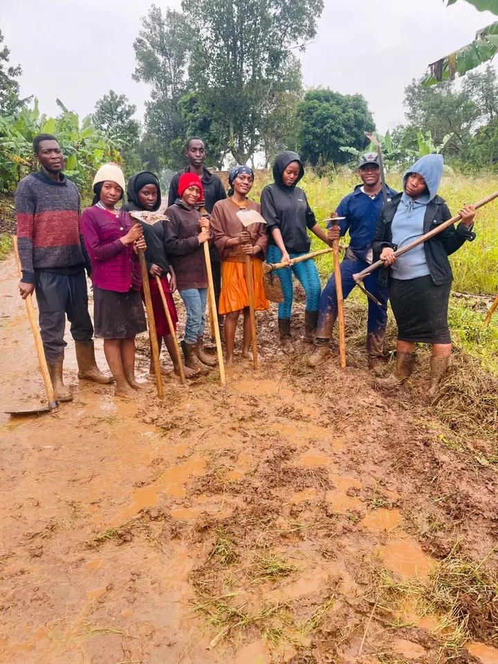 A group of young farmers on their way from the garden.