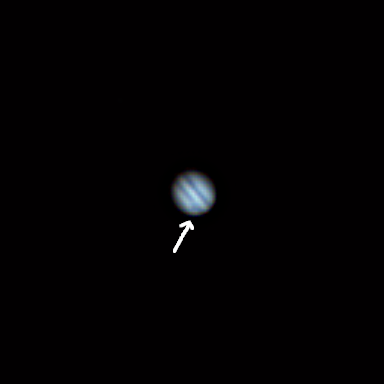 Okay, this takes a bit of imagination, but the arrow points at the Great Red Spot. Seriously.