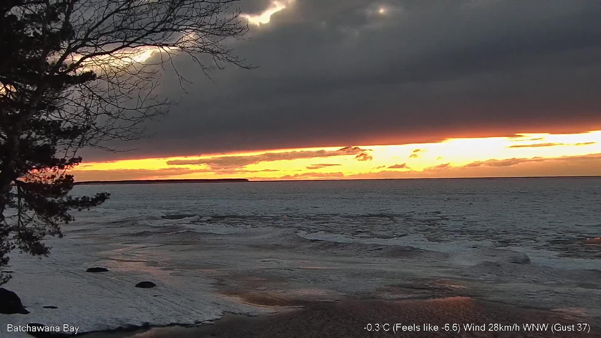 View looking north into the Batchawana Bay and Lake Superior. // Image captured at: 2026-04-19 00:48:13 UTC (about 1 min. prior to this post) // Image sourced from: youtube.com/@jakecormier // Current Temp in Goulais River: 33 F | 0 C // Precip: broken clouds // Wind: WNW at 14 mph | 23 kph // Humidity: 67%