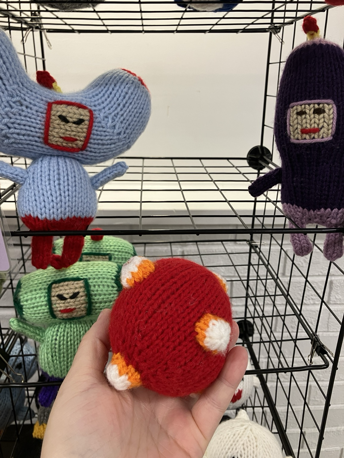 Knit katamari ball in front of some knit katamari prince and cousin characters