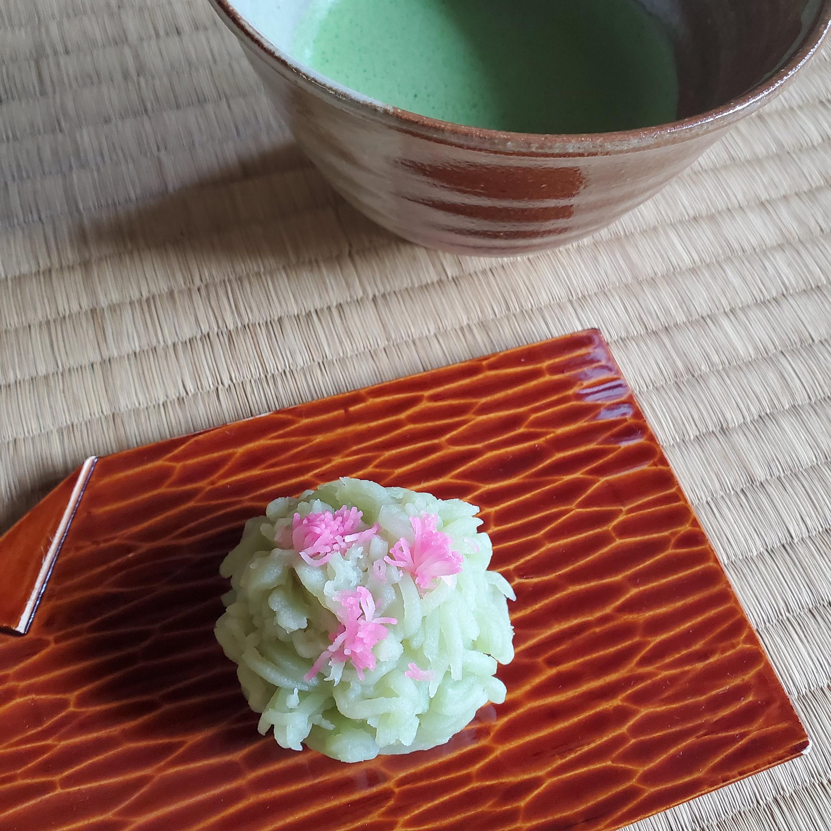 'Tsutsuji kinton' is a colourful looking sweet that mimics a miniature azalea bush. Kinton are made from a type of yam (the soft dough coloured and shredded, and carefully placed around a sweet bean jam filling).