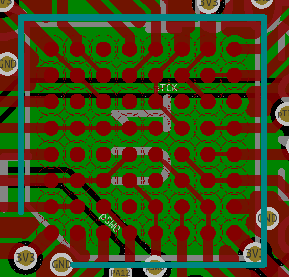 A close-up of a BGA footprint in KiCAD, the PCB traces are all routed straight though the I/O pins.