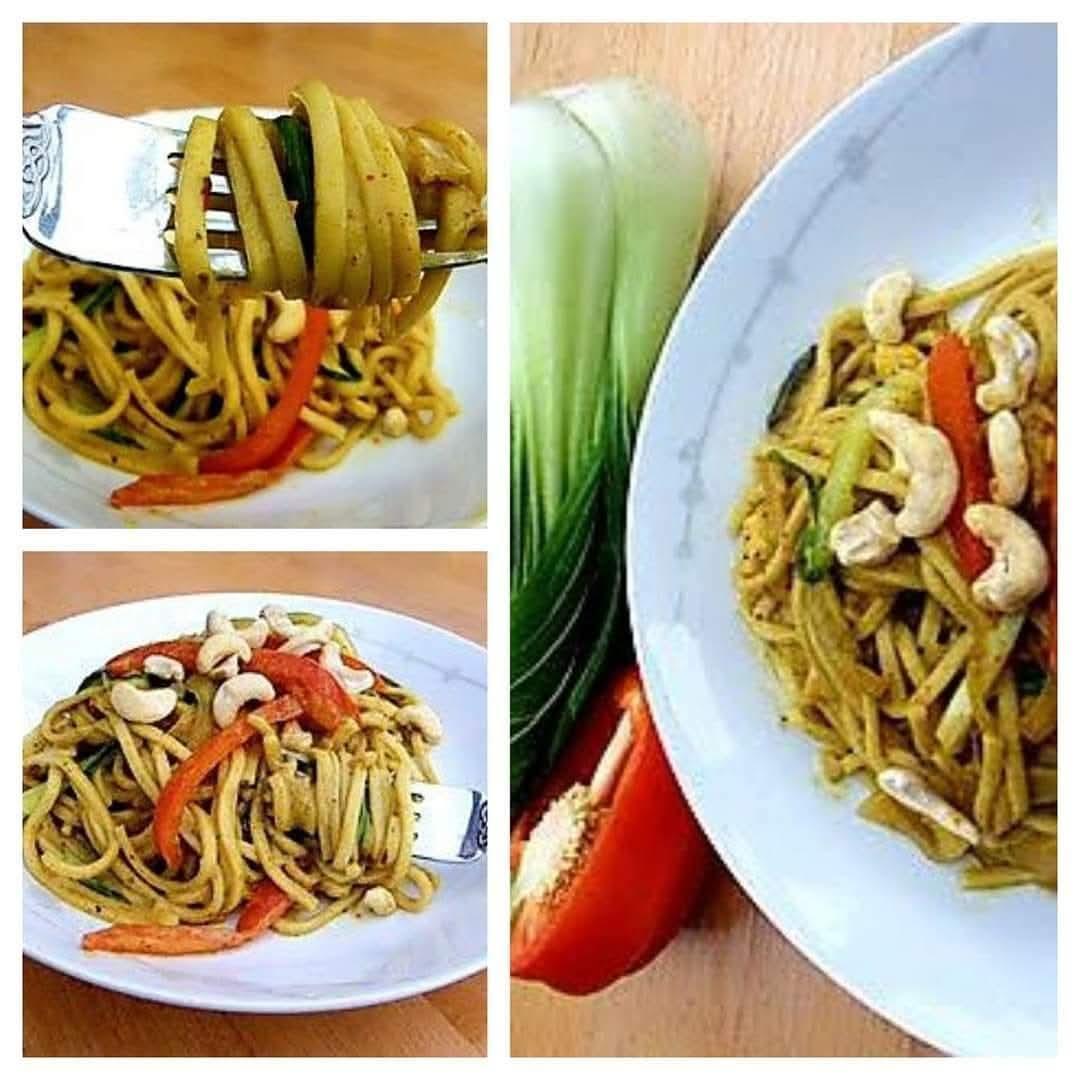 Peanut butter noodles with veg and topped with cashew nuts