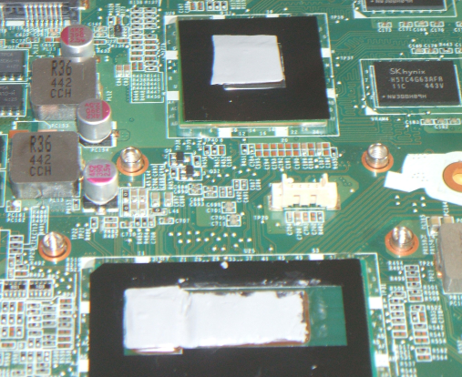 Thermal pad edges not straight because of tearing &amp; refitting what stuck to the peeled film.  After that added pad to chip at back afterwards, and its pad edges are neater.