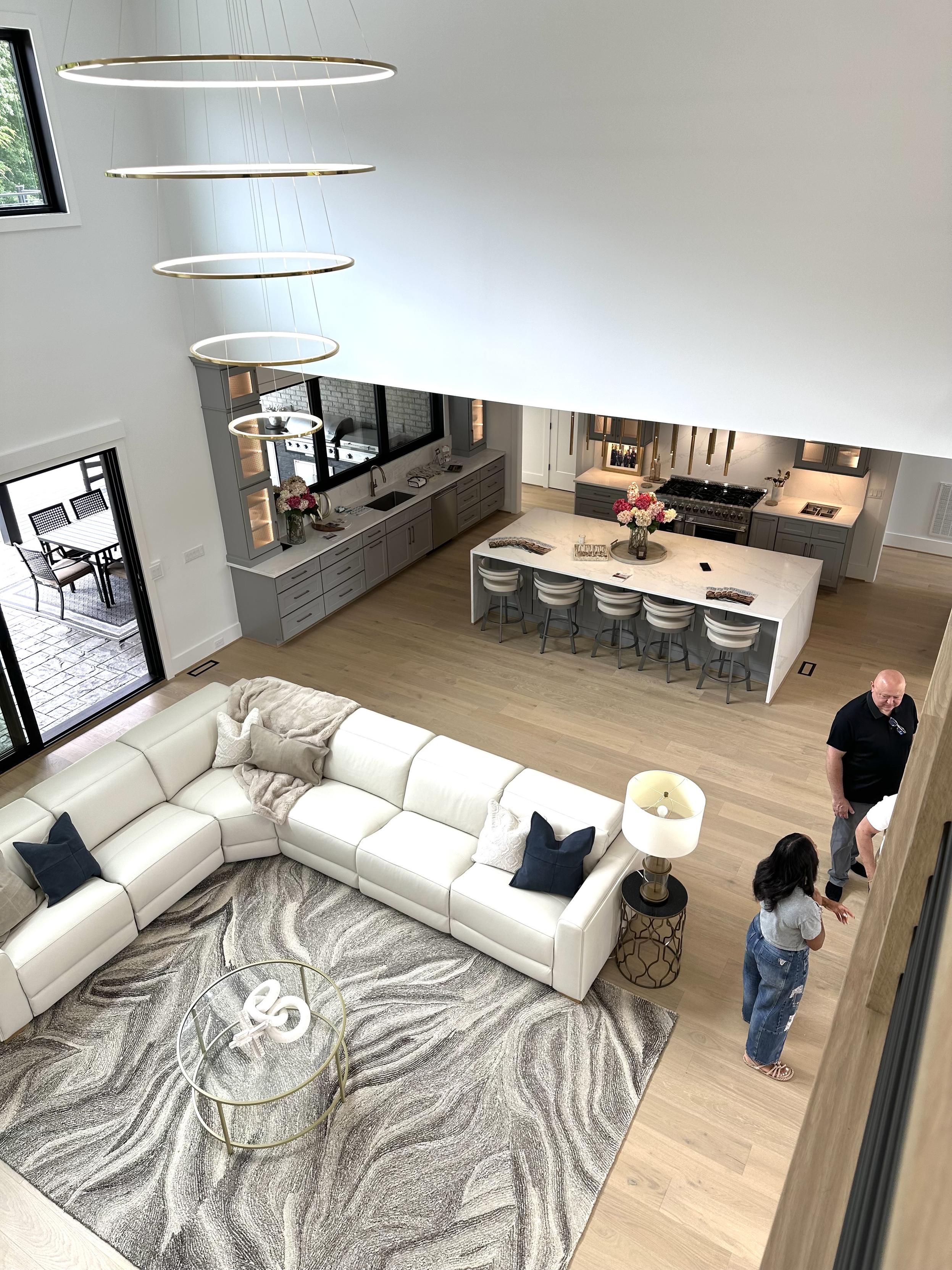 Looking down on the cavernous great room into the kitchen