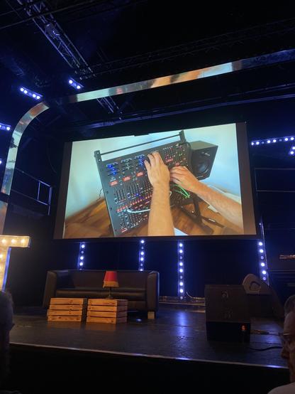 André showing a video in which he is playing on a synthesizer he connected to openDAW
