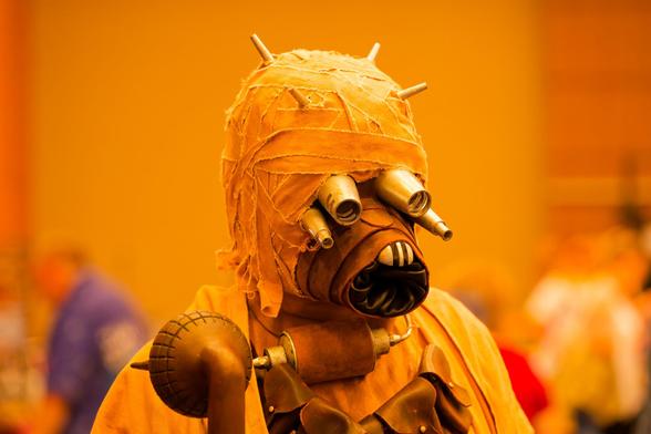 Tatooine sandperson looks yellow in a yellow conference room