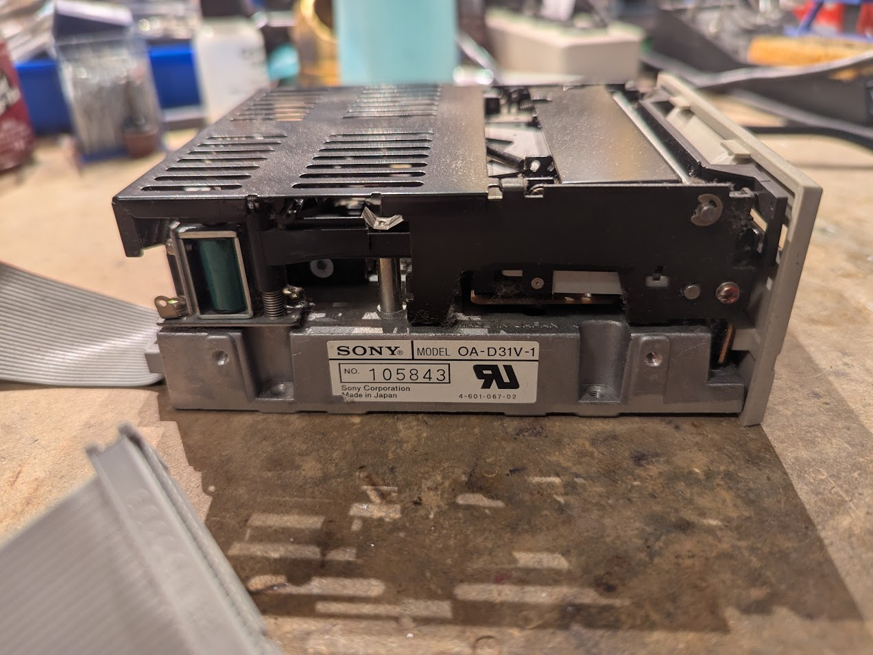 side view of the floppy drive with the Sony model number sticker. It's as tall as a half-height 5 1/4" drive, or somewhat taller than a standard 3.5" drive you might be familiar with.