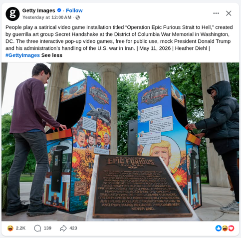 SCREENSHOT:

PHOTO: Two people standing and playing video game arcade consoles featuring artwork branded as "Operation Epic Furious: Strait to Hell" and depicting Donald Trump, Pete Hegseth, Kash Patel, JD Vance, and RFK Jr. along with quotes and tweets from some of them. Between the two players is a plaque reading "Operation Epic Furious: Strait to Hell. The Trump administration knows thatt the best way to sell combat is by making it a video game. That's why they've been pumping out the sickes…