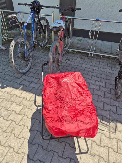 Bicycles with a trailer.