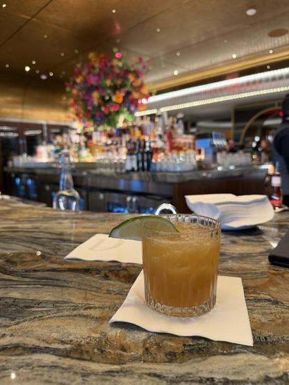 A Caribbean Nights cocktail on a bar