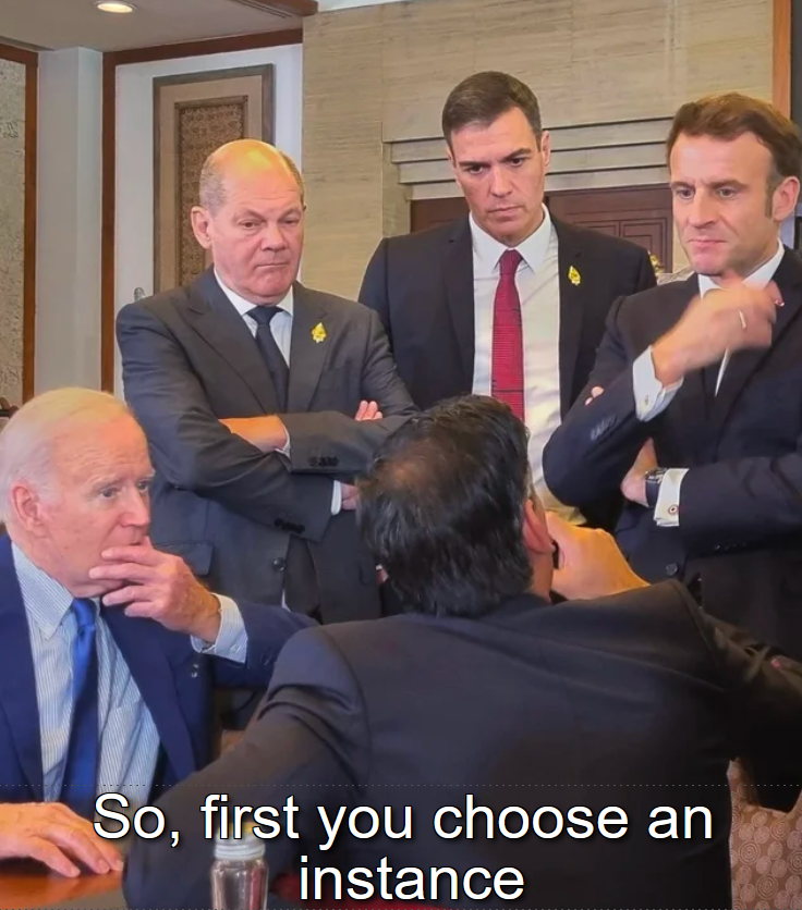 Several heads of government at a G7 summit discussing something.
Text: "So, first you choose an instance"