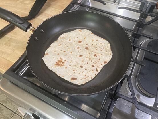 Making a tortilla in a pan.