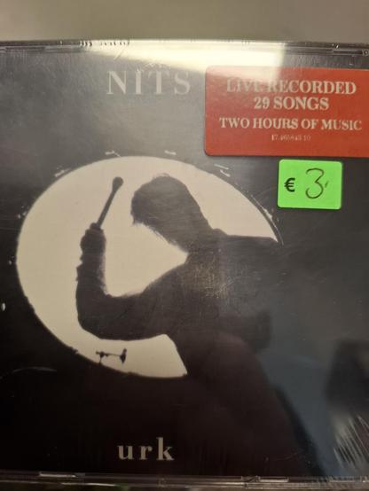 Cover of the second hand CD "Urk" by the Nits. It has a sticker saying β¬3